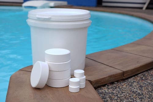 Chlorine Pucks By Pool - Chlorine is an effective swimming pool sanitizer